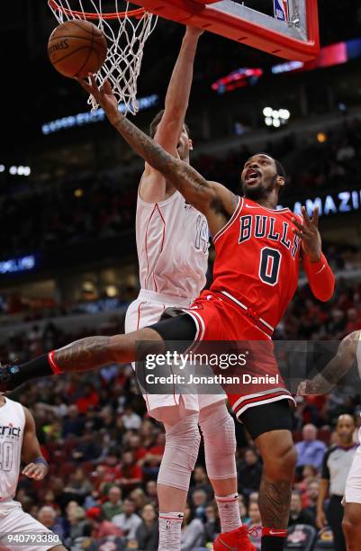 Sean Kilpatrick of the Chicago Bulls puts up a shot against Jason Smith of the Washington Wizards at the United Center on April 1, 2018 in Chicago,...