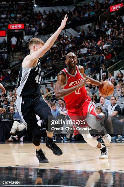 Luc Mbah a Moute of the Houston Rockets drives to the basket during the game against the San Antonio Spurs on April 1, 2018 at the AT&T Center in San...