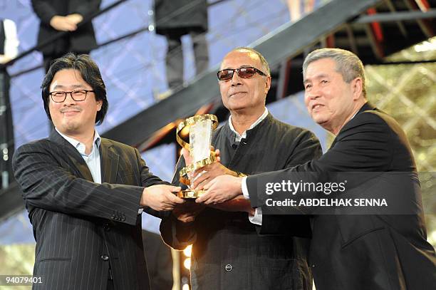 South-Korean diretor Park Chan Wook, and Park Chan Wook receive a tribute from Iranian director and president jury Abbas Kiarostami at Jemaa El Fna...