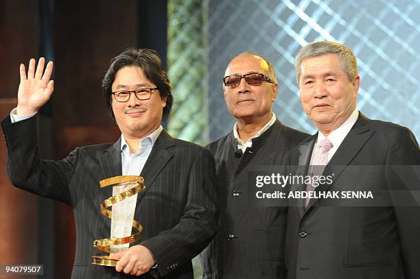 South-Korean diretor Park Chan Wook, and Park Chan Wook receive a tribute from Iranian director and president jury Abbas Kiarostami at Jemaa El Fna...