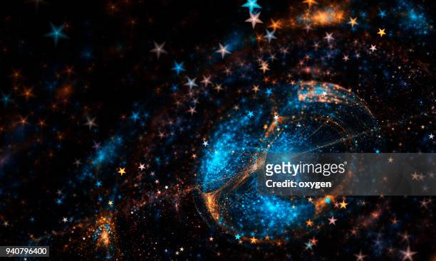 blue and yellow space stars - liquid galaxy stock pictures, royalty-free photos & images