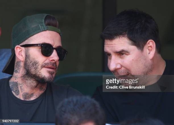 David Beckham with Marcelo Claure CEO of Sprint as they watch Alexander Zverev of Germany against John Isner of the United States in the mens final...