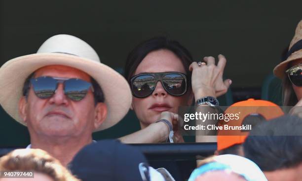 Victoria Beckham watches Alexander Zverev of Germany against John Isner of the United States in the mens final during the Miami Open Presented by...