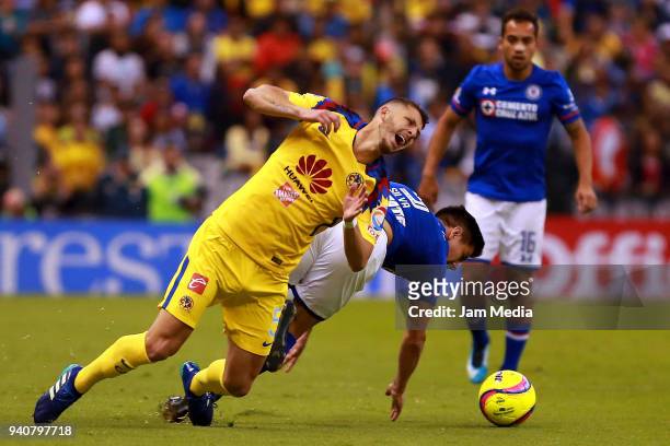 Guido Rodriguez of America fights for the ball with Francisco Silva of Cruz Azul during the 13th round match between America and Cruz Azul as part of...
