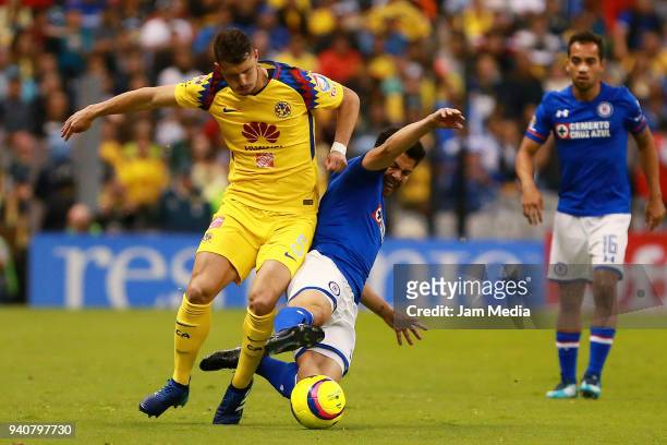 Guido Rodriguez of America fights for the ball with Francisco Silva of Cruz Azul during the 13th round match between America and Cruz Azul as part of...