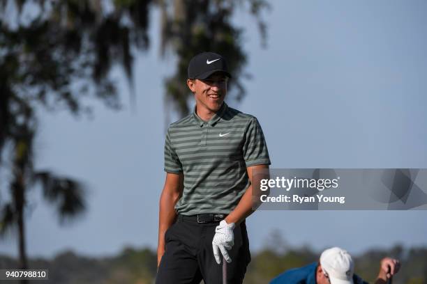 Cameron Champ reacts after holing out on the 18th green during the final round of the Web.com Tour's Savannah Golf Championship at the Landings Club...