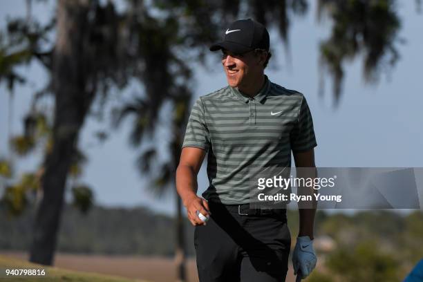Cameron Champ reacts after holing out on the 18th green during the final round of the Web.com Tour's Savannah Golf Championship at the Landings Club...