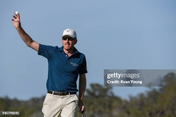 Roberto Castro acknowledges the crowd on the 18th green during the final round of the Web.com Tour's Savannah Golf Championship at the Landings Club...