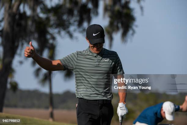 Cameron Champ reacts after holing out on the 18th green during the final round of the Web.com Tour's Savannah Golf Championship at the Landings Club...