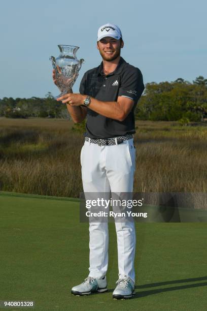 Sam Burns poses for photos with the trophy during the final round of the Web.com Tour's Savannah Golf Championship at the Landings Club Deer Creek...