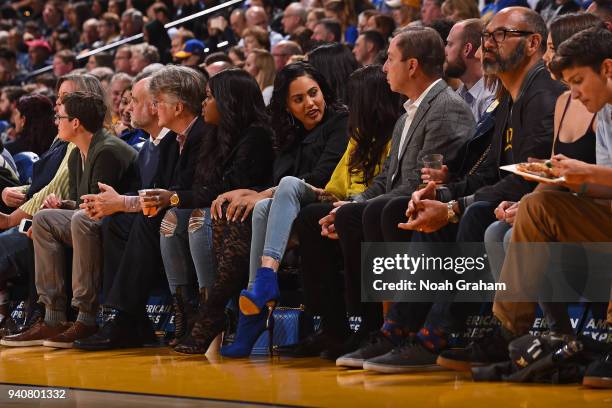 Ayesha Curry sits courtside during the Golden State Warriors v Atlanta Hawks game on March 23, 2018 at ORACLE Arena in Oakland, California. NOTE TO...