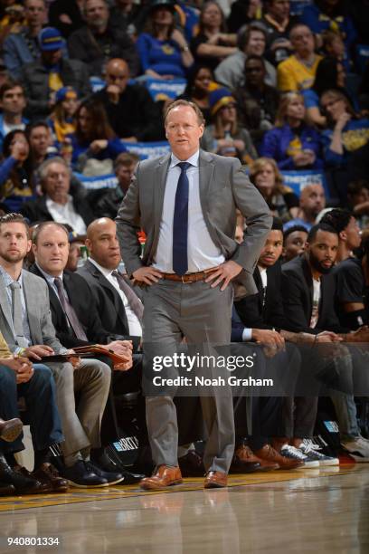 Head Coach Mike Budenholzer of the Atlanta Hawks looks on during the game against the Golden State Warriors on March 23, 2018 at ORACLE Arena in...