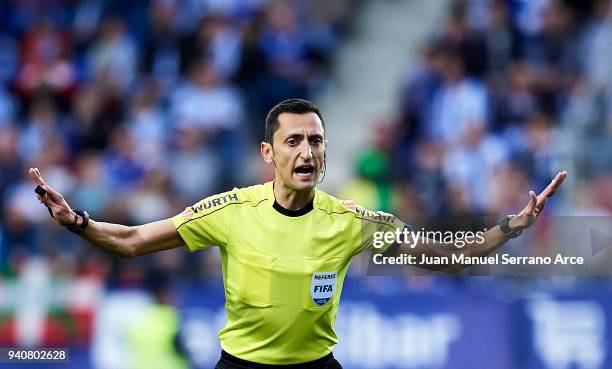 Spanish referee Jose Maria Sanchez Martinez reacts during the La Liga match between SD Eibar and Real Sociedad de Futbol at Estadio Municipal de...