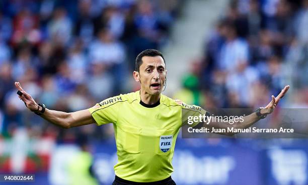 Spanish referee Jose Maria Sanchez Martinez reacts during the La Liga match between SD Eibar and Real Sociedad de Futbol at Estadio Municipal de...