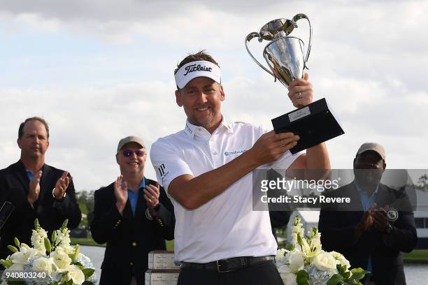 Ian Poulter of England poses with the winner's trophy after winning the Houston Open at the Golf Club of Houston on April 1, 2018 in Humble, Texas.