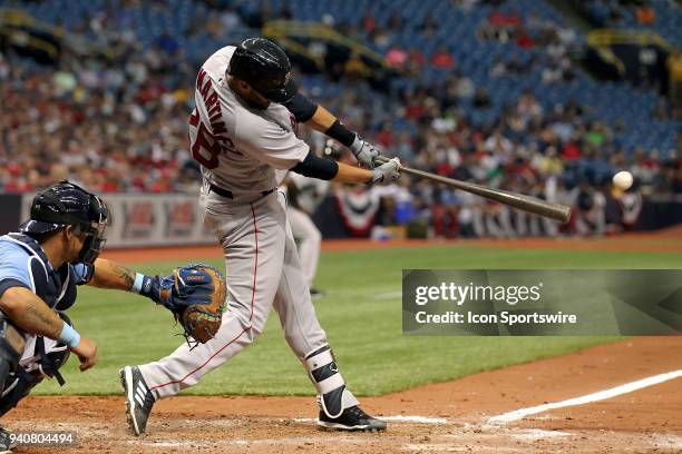 Martinez of the Red Sox knocks in a run batted in during the MLB regular season game between the Boston Red Sox and the Tampa Bay Rays on April 01 at...