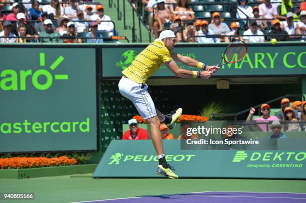 John Isner in action during the finals of the 2018 Miami Open held at the Tennis Center at Crandon Park on April 1, 2018 in Key Biscayne, FL.