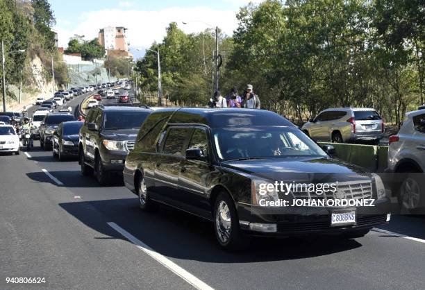 View of a funeral car carrying former Guatemalan dictator , retired General Jose Efrain Rios Montt, before arriving at the cemetery, in Guatemala...