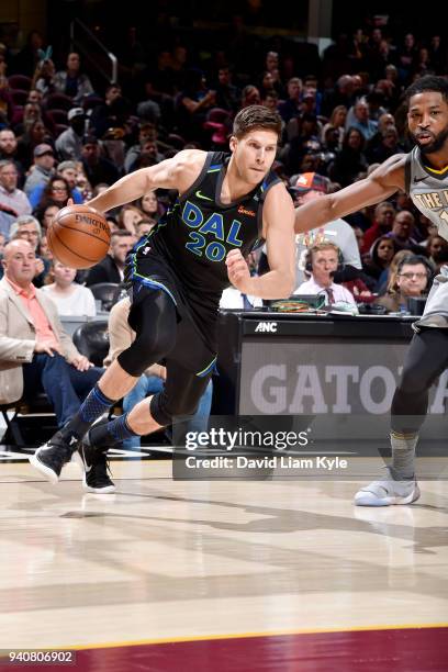 Doug McDermott of the Dallas Mavericks handles the ball during the game against the Cleveland Cavaliers on April 1, 2018 at Quicken Loans Arena in...