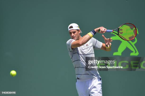 John Isner in action during the finals of the 2018 Miami Open held at the Tennis Center at Crandon Park on April 1, 2018 in Key Biscayne, FL.