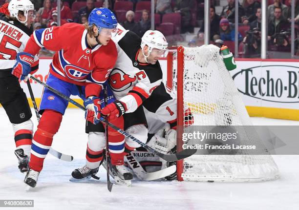 Jacob De La Rose of the Montreal Canadiens positions himself to deflect a shot against the New Jersey Devils in the NHL game at the Bell Centre on...
