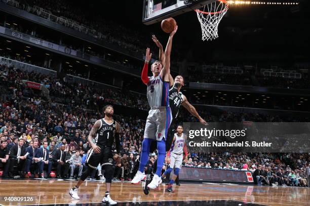 Luke Kennard of the Detroit Pistons handles the ball against the Brooklyn Nets on April 1, 2018 at Barclays Center in Brooklyn, New York. NOTE TO...