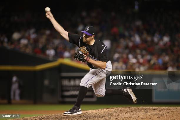 Relief pitcher Bryan Shaw of the Colorado Rockies pitcher against the Arizona Diamondbacks during the MLB game at Chase Field on March 30, 2018 in...