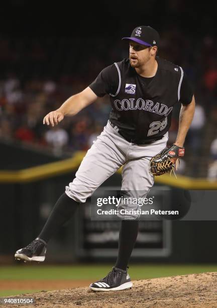 Relief pitcher Bryan Shaw of the Colorado Rockies pitcher against the Arizona Diamondbacks during the MLB game at Chase Field on March 30, 2018 in...