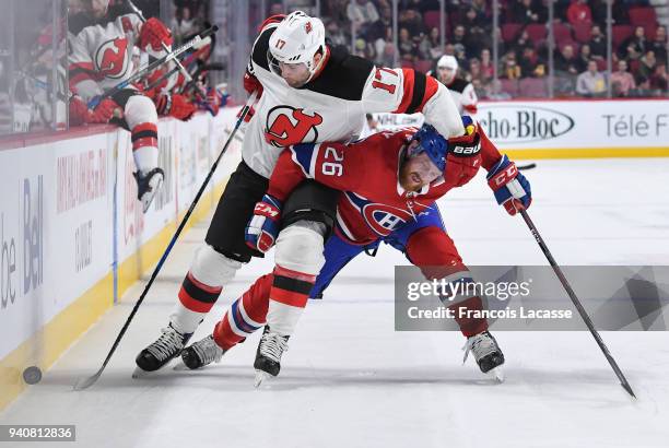 Jeff Petry of the Montreal Canadiens tries to slow down Patrick Maroon of the New Jersey Devils in the NHL game at the Bell Centre on April 1, 2018...