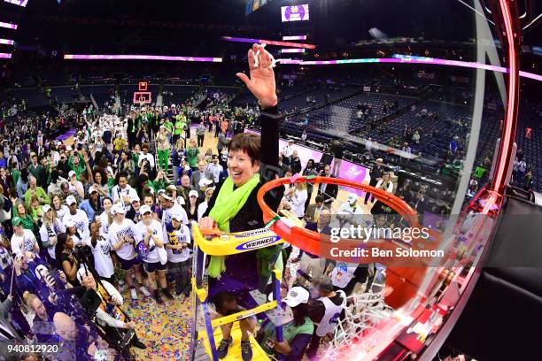 Notre Dame Fighting Irish head coach Muffet McGraw waves to the crowd after cutting a piece of the net to celebrate beating Mississippi in the...