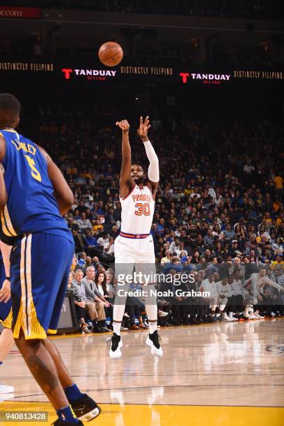 Troy Daniels of the Phoenix Suns shoots the ball against the Golden State Warriors on April 1, 2018 at ORACLE Arena in Oakland, California. NOTE TO...
