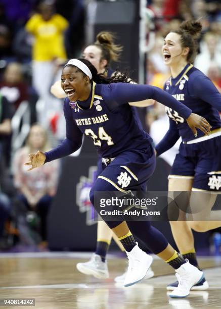 Arike Ogunbowale of the Notre Dame Fighting Irish celebrates after scoring the game winning basket with 0.1 seconds remaining in the fourth quarter...