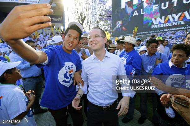 Mexico's presidential candidate Ricardo Anaya , standing for the "Mexico al Frente" Coalition of the PAN-PRD parties, takes a picture with his...