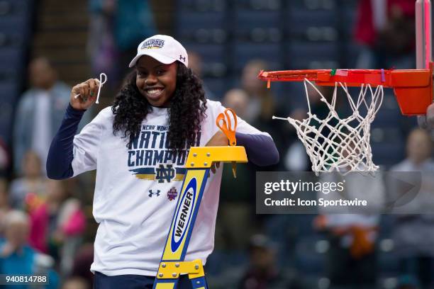 Notre Dame Fighting Irish guard Arike Ogunbowale celebrates after winning the National Championship game between the Mississippi State Lady Bulldogs...