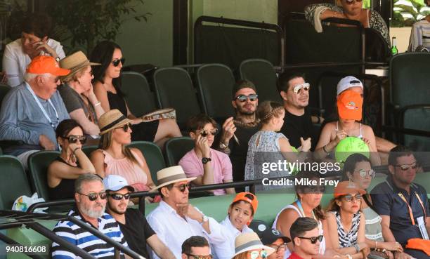 David and Victoria Beckham and their daughter Harper and son Romeo, watching John Isner of the USA against Zverev of Germany 6-7 6-4 6-4 in the men's...