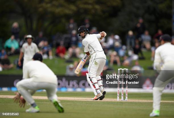 An edge from New Zealand batsman Jeet Raval falls just short of slip fielder James Vince during day four of the Second Test Match between the New...
