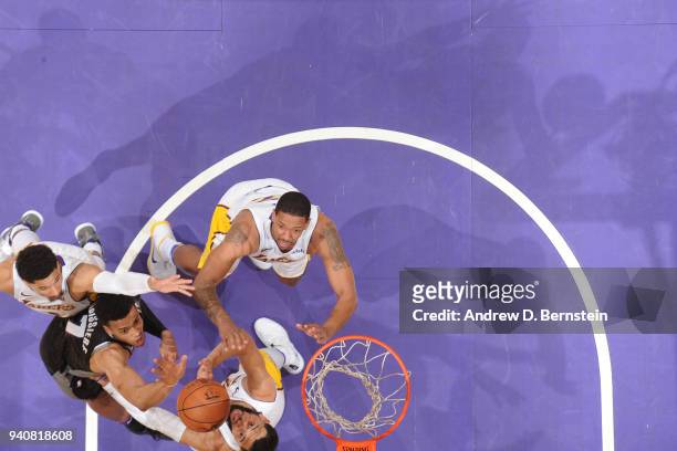 Tyler Ennis of the Los Angeles Lakers and Skal Labissiere of the Sacramento Kings reach for the ball on April 1, 2018 at STAPLES Center in Los...