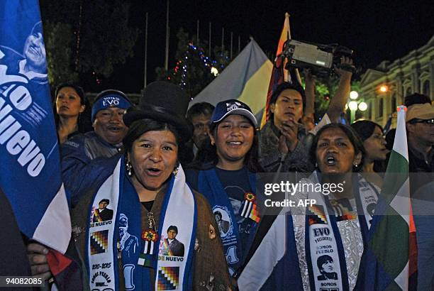 Supporters of Bolivian President Evo Morales celebrate his reelection in La Paz on Diciembre 6, 2009. Bolivia's leftist President Evo Morales won a...