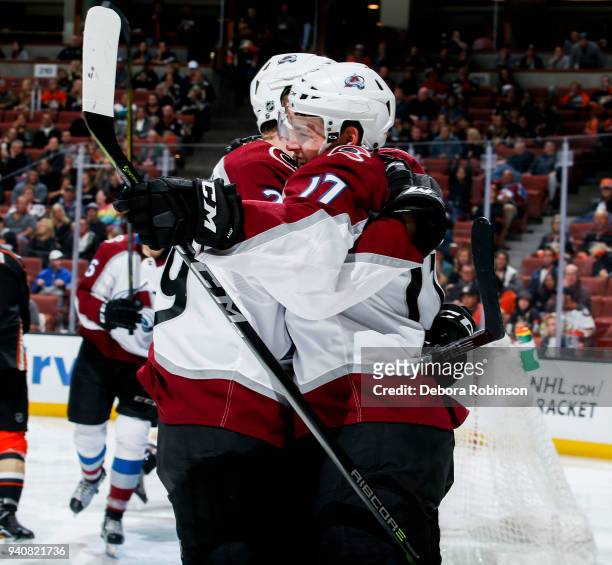 Nathan MacKinnon and Tyson Jost of the Colorado Avalanche celebrates Jost's second-period goal during the game against the Anaheim Ducks at Honda...
