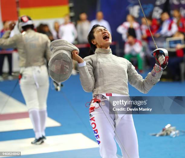 Jiyeon Kim of Korea celebrates a win over Saoussen Boudiaf of France during the final rounds of the SK Telecom Seoul Sabre Grand Prix on April 1,...