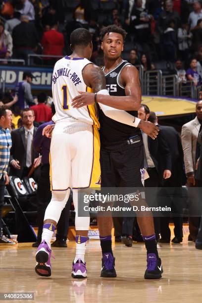 Buddy Hield of the Sacramento Kings and Kentavious Caldwell-Pope of the Los Angeles Lakers hug after the game between the two teams on April 1, 2018...