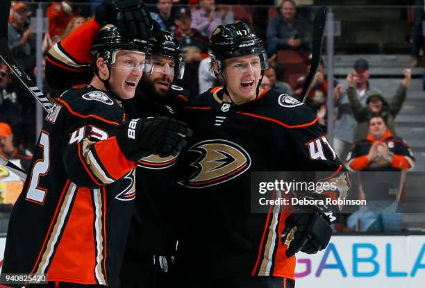 Josh Manson, Ryan Kesler and Hampus Lindholm of the Anaheim Ducks celebrate Kesler's third-period goal during the game against the Colorado Avalanche...