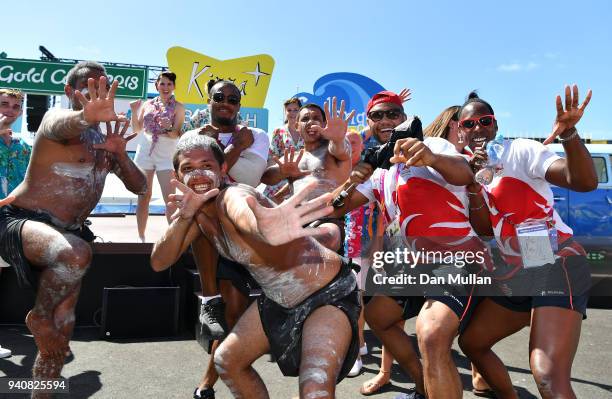 Members of Team England pose with performers following the Team England welcome ceremony at the Athletes Village ahead of the 2018 Commonwealth Games...