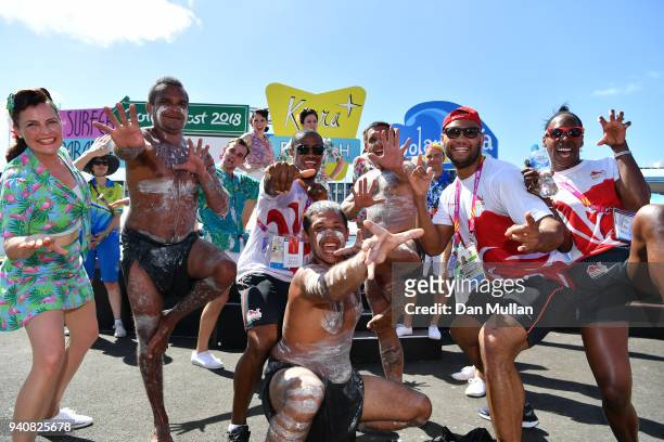 Members of Team England pose with performers following the Team England welcome ceremony at the Athletes Village ahead of the 2018 Commonwealth Games...
