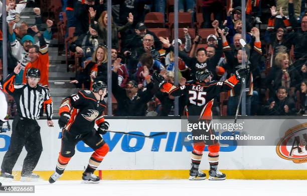 Josh Manson and Ondrej Kase of the Anaheim Ducks celebrate Kase's overtime goal as the Ducks defeat the Colorado Avalanche 4-3 in the game at Honda...