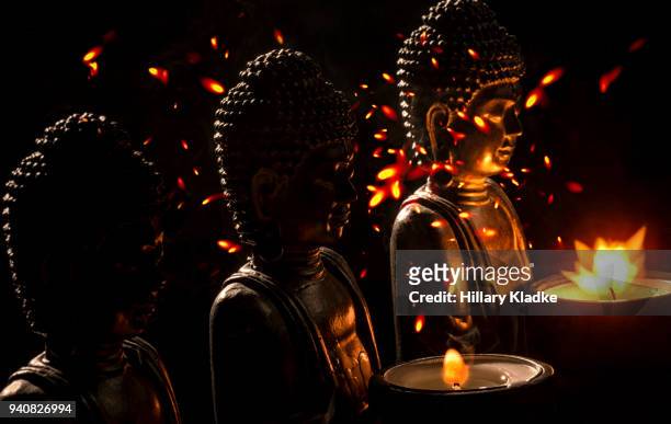 buddha statues with fire - hot indian model fotografías e imágenes de stock