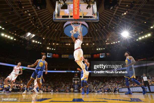 Marquese Chriss of the Phoenix Suns handles the ball against the Golden State Warriors on April 1, 2018 at ORACLE Arena in Oakland, California. NOTE...