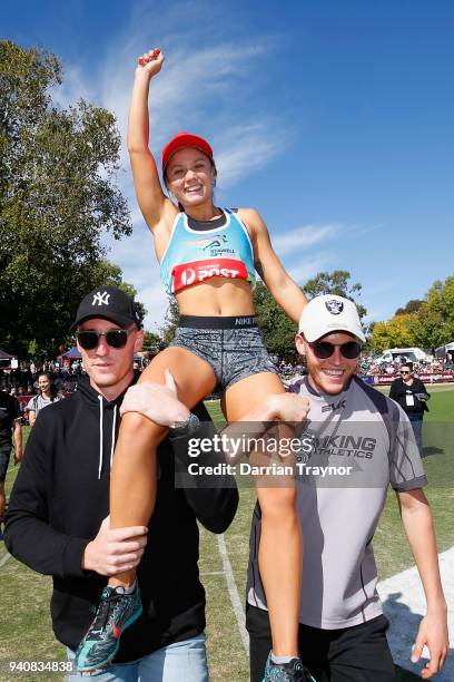 Elizabeth Forsyth celebrates a winning the Women's Stawell Gift on April 2, 2018 in Stawell, Australia.