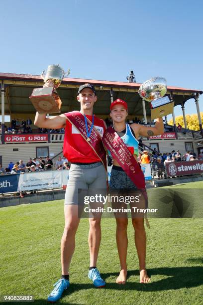 Jacob Despard and Elizabeth Forsyth pose with the the winners trophies after Stawell Gift on April 2, 2018 in Stawell, Australia.