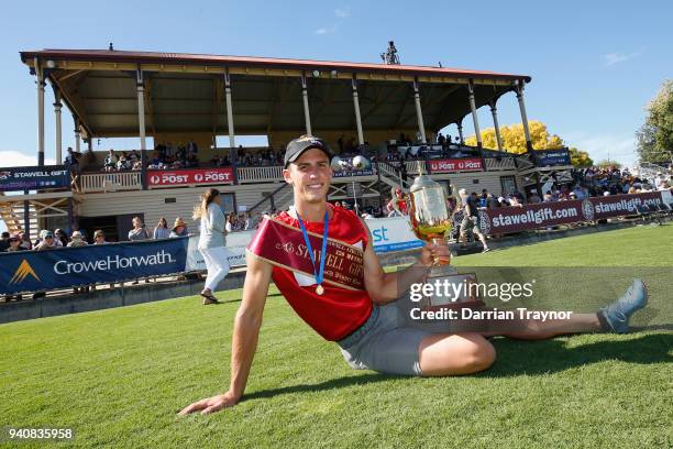 Jacob Despard poses with the the winners trophie after Stawell Gift on April 2, 2018 in Stawell, Australia.